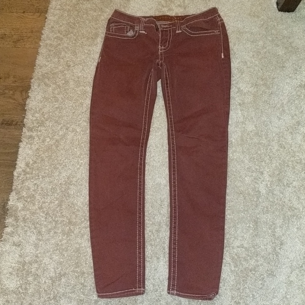 Burgundy skinny jeans